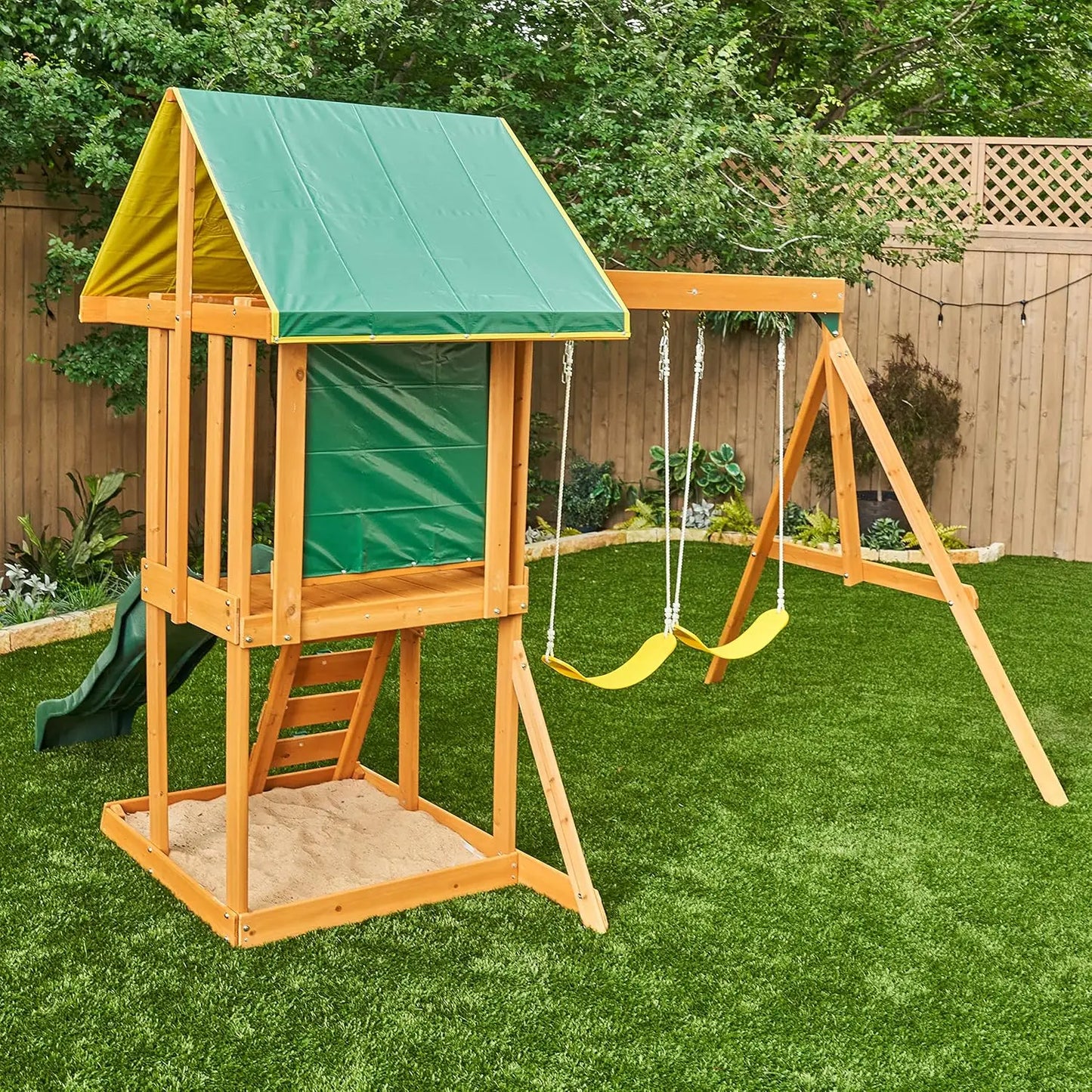 Outdoor Wooden Swing Set with Chalk Wall and Shaded Deck